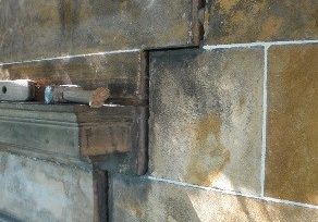 Georgian shopfront in Elgin; when the retail space was deepened someone forgot to reconnect the façade.  Smith & Garratt were called in to see why the re-pointing works were taking so long!
